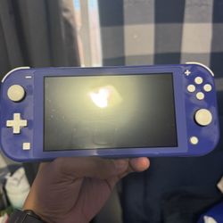 Nintendo Switch Lite (w Games)