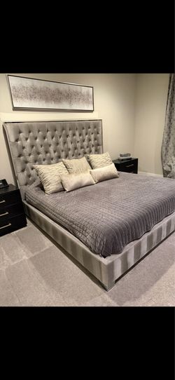 Grey tufted king bed