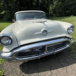 1956 Oldsmobile 2 Door Coupe Red and White