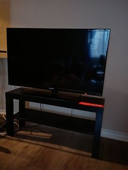 Samsung Flat Screen TV and TV stand