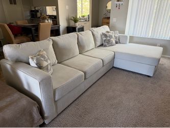 Sofá modular + puf ottoman con almacenamiento