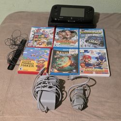 Nintendo Wii U GamePad console with 6 games