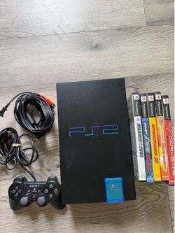 PlayStation 2 with games and memory card