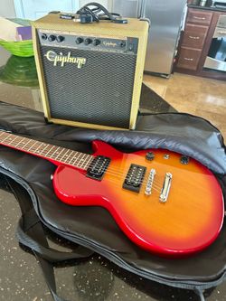 Gibson Epiphone phone electric guitar and amp Near perfect condition.