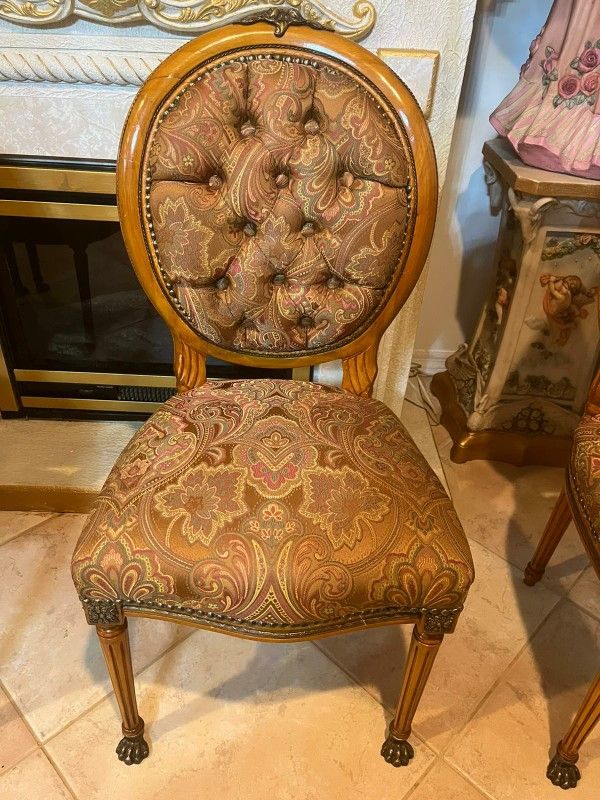 4 Antique Small Chairs With Bronze accents In the legs and top of the chairs