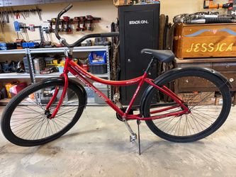 32” wheel single speed cruiser bicycle.