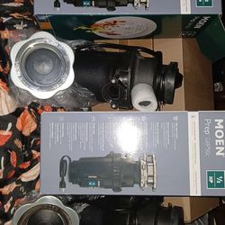 2 food disposals/ 2 molinos de sink de cocina