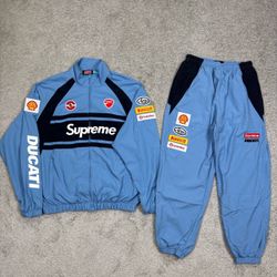 2 piece suit supreme size medium