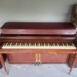 Vintage brown wood piano
