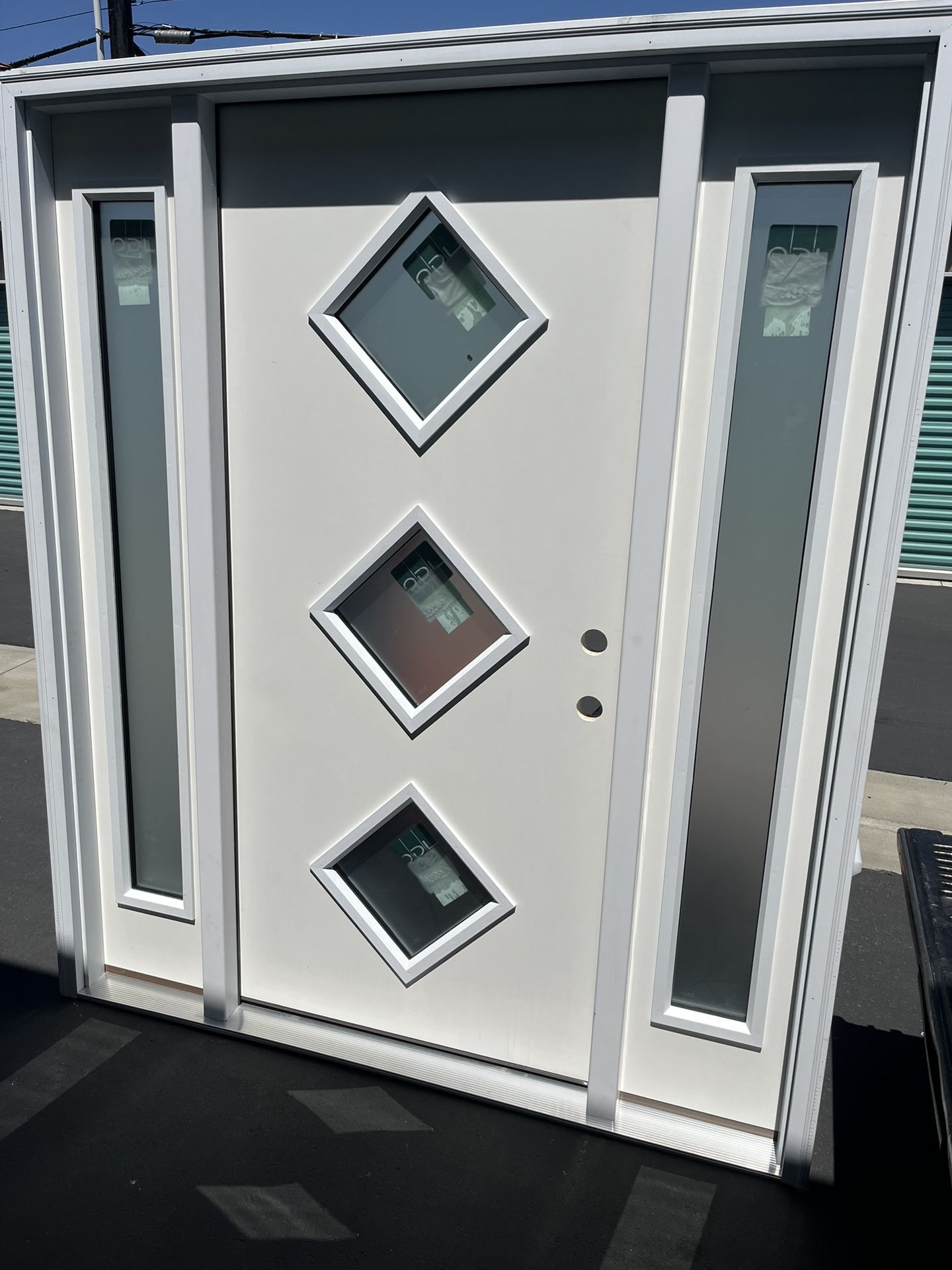 64in x 80in Left-Hand Inswing 3-Lite Frosted Glass Primed Fiberglass Prehung Front Door