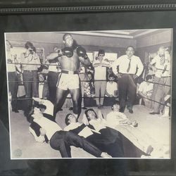 Cassius Clay (autographed) & The Beatles