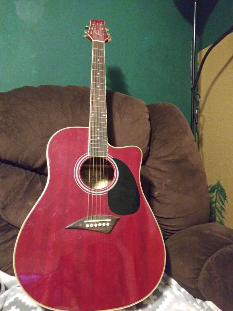 KONA red acoustic guitar