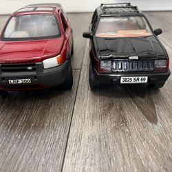 Diecast 1/18 scale jeep grand Cherokee 1997 and Land Rover freelander both for 25 dollars 