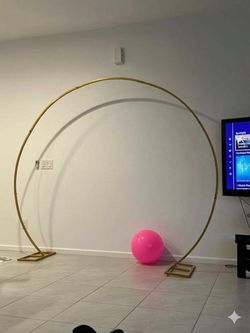 Round arch for party decorations. Gold