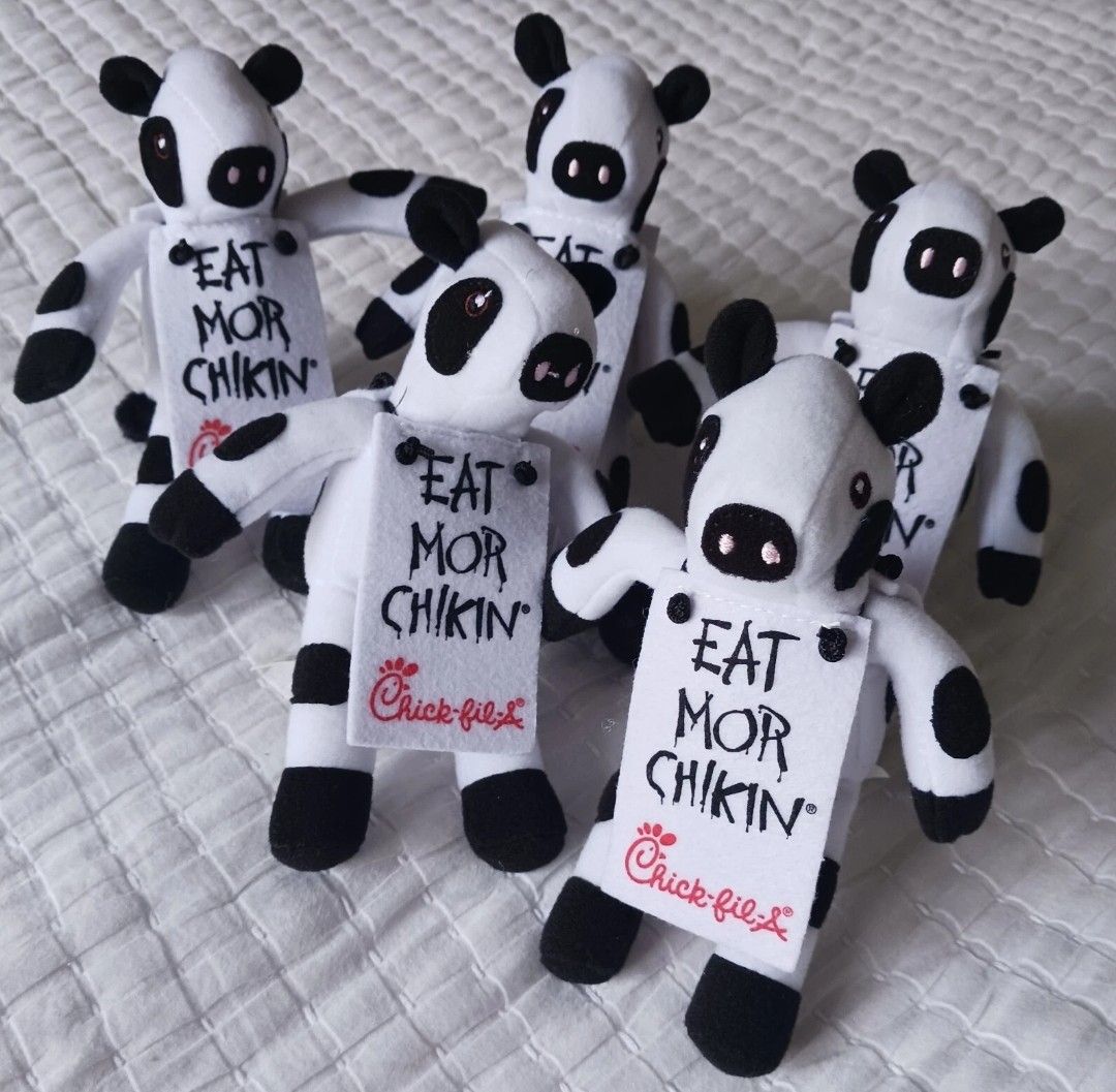 Official Vintage Chick-fil-A promo cows plush with the iconic “Eat Mor Chikin” sign.(1(contact info removed))