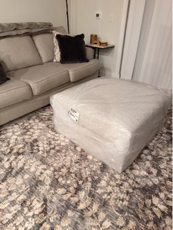 Ottoman from Ashley’s  BRAND NEW