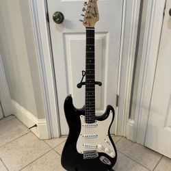 Fender Squier Stratocaster Electric Guitar. Black Finish