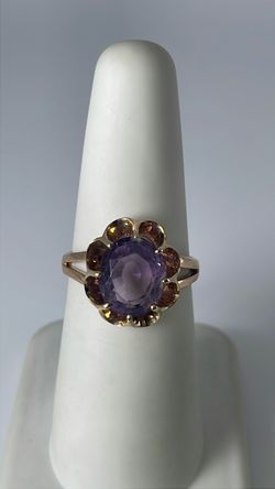 14k gold flower ring with purple CZ