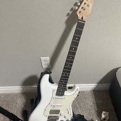 Donner electric guitar + Fender amplifier (with stand)