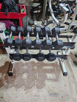 200lbs of rubber hex dumbbells & rack