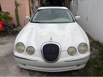 2002 jaguar S type four-door leather interior about 140,000 miles runs good. It’s not a hot rod. It’s an elegant car with the killer stereo system. Th