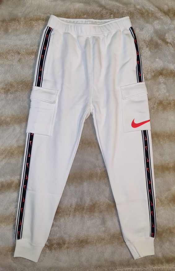 Nike Sportswear Repeat Men s Fleece Cargo Pants #DX2030-133
Men's Sz Small

