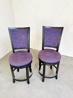 A Pair of Upholstered Counter Stools