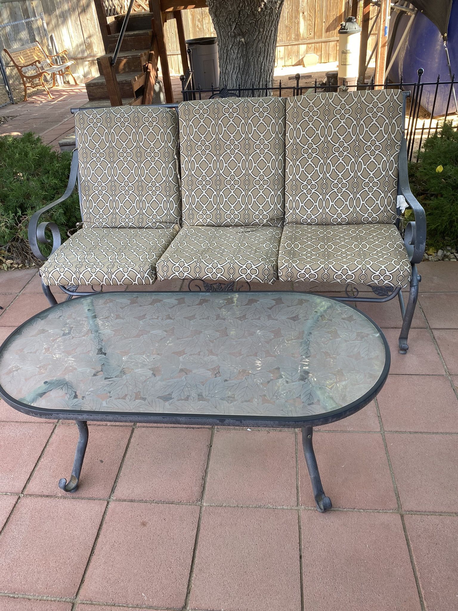 Wrought Iron Loveseat And Glass Coffee Table