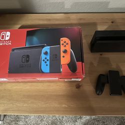 Nintendo Switch Console (Neon Red/Blue) - Ready to Play Bundle