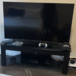 Glass TV Stand  holds up to 58’ TV