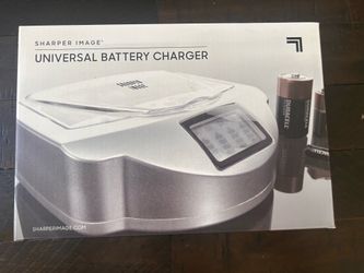 NIB universal battery charger Sharper Image FATHERS DAY