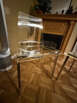 2 acrylic chairs