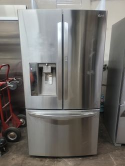 LG 31 cubic foot refrigerator with silver door in the door