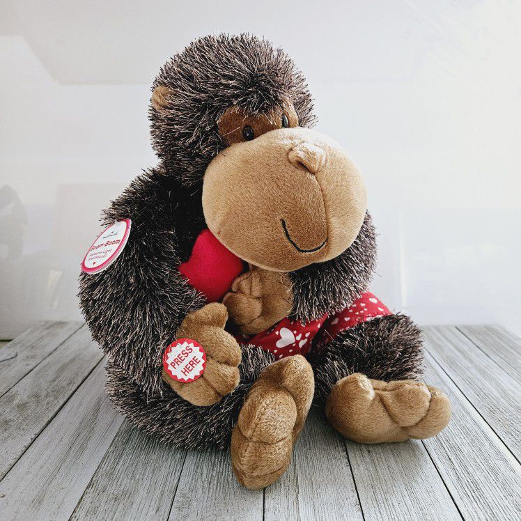 Vintage 10" Boom Boom the Brown  Fuzzy Monkey with Red Hearts Cotton Pants by Hallmark. Battery Operated. Requires 2 AA Batteries included. 

Pre-owne