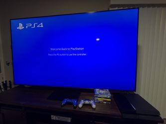 Sony PlayStation 4 1TB Console with 2 Controllers & 6 Games