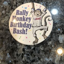 Vintage Los Angeles Angels Baseball Of Anaheim Rally Monkey Birthday Bash Pinback Pin.  Has been on display in a cabinet with a Angels Baseball collec