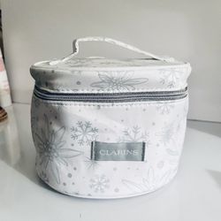 Clarins Cosmetic Bag Recycled Fibers.  New.  Round Shape. Mirror Inside. Comes from a smoke free environment.  