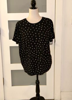Zara short-sleeved blouse in black with a polka dot print, possibly in gold tones,