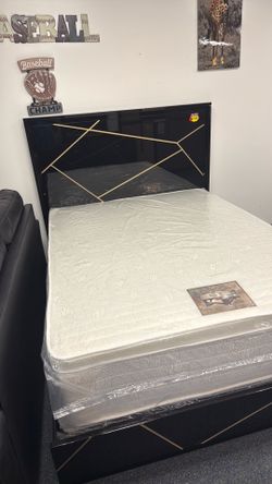 New Queen LED bed with the pillow top mattress half of