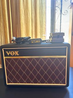 Vox V9106 Pathfinder 10 Electric Guitar Amp with VoxDigital Reverb Delay Pedal and 9 Volt Power Adapter.