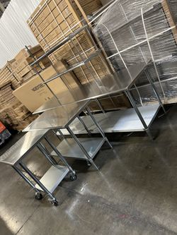 Brand new stainless steel work tables