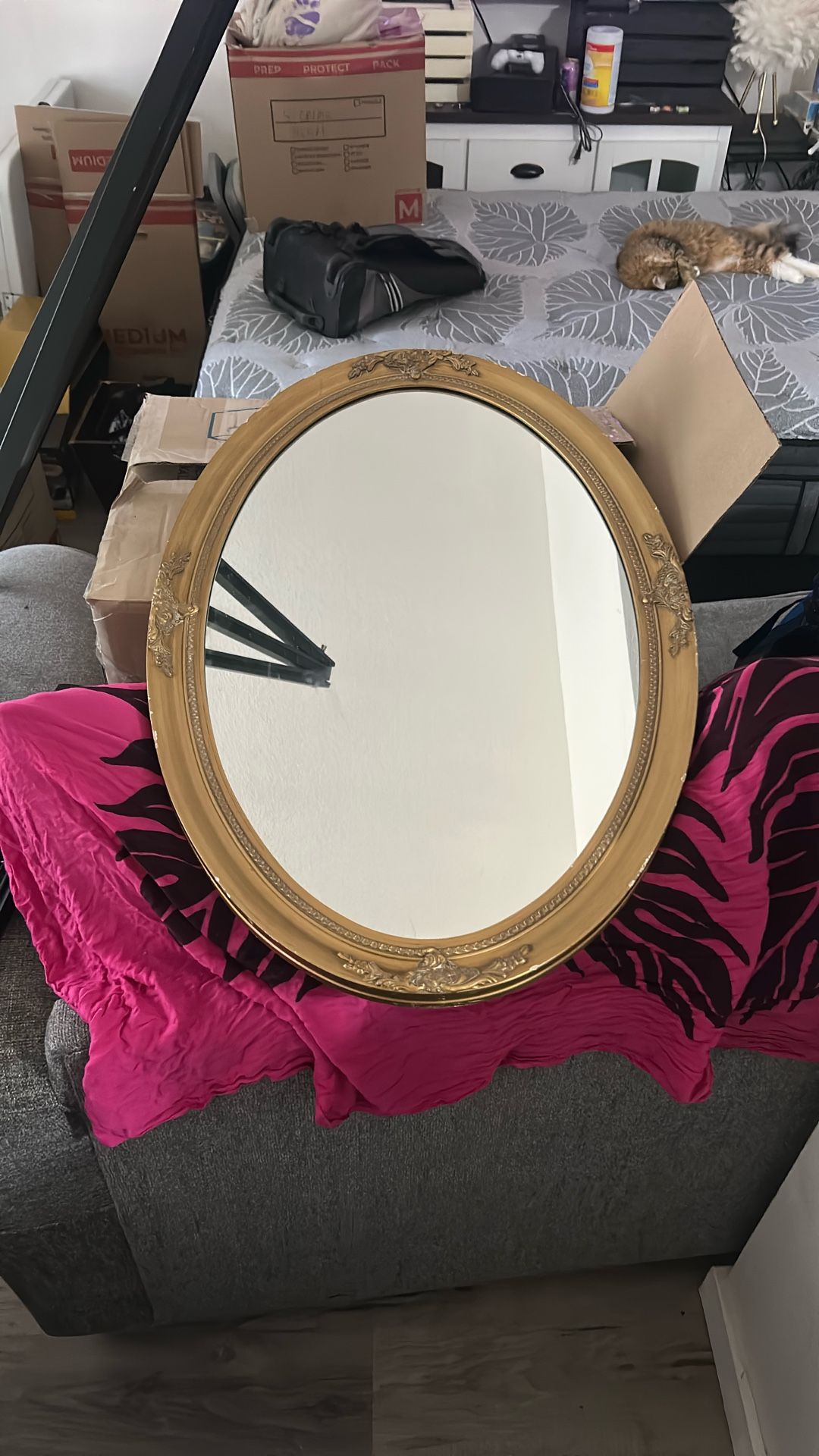 Golden trimmed mirror