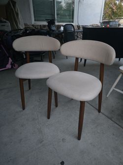 Dining chairs asking 50 obo for both