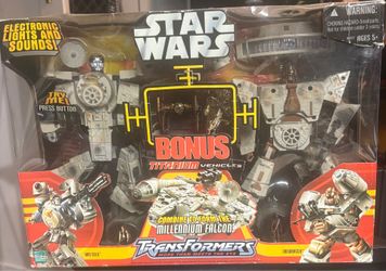 2006 Hasbro Star Wars Transformers Han Solo and Chewbacca Millennium Falcon set.