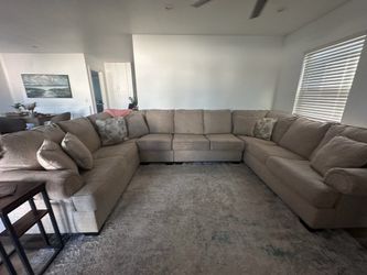 Sectional …. Oatmeal colored sofa couch