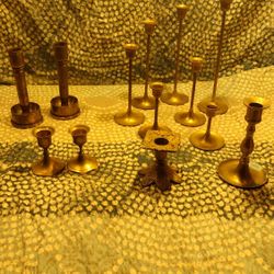 13 Brass Taper Candle Holders (NEED CLEANED AND POLISHED )