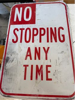 Used No stopping any time metal sign