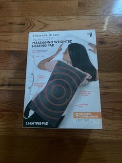 Weighted heated and massage pad