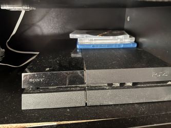 PlayStation 4 Plus 2 Controllers And Games