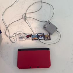 3ds With 5 Games And Charger With Case
